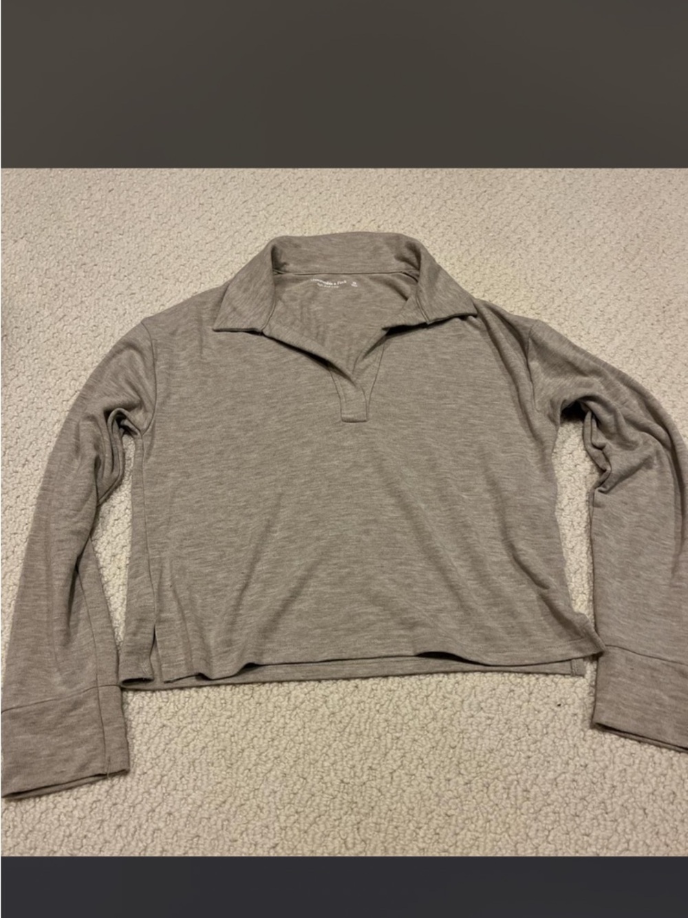 gray beige long sleeve collared top mild discoloration